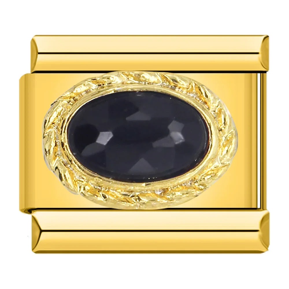 Gold with black stone